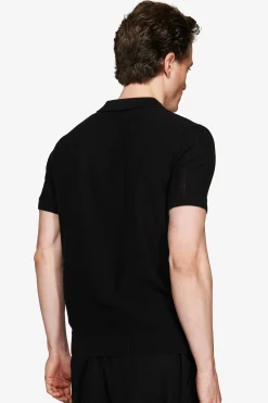 Black perforated knit polo shirt