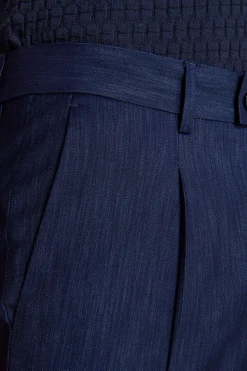 Dark blue denim effect trousers