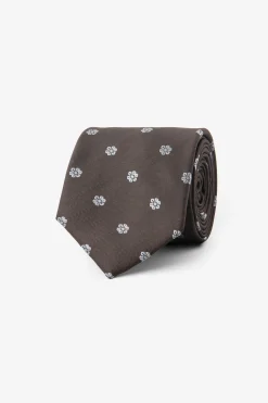 Dark brown floral design tie