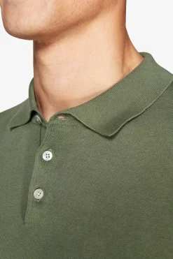 Green knit polo shirt