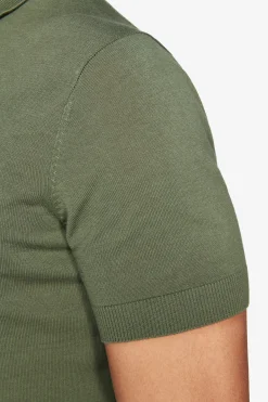 Green knit polo shirt