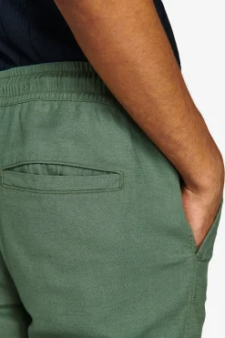 Green textured drawstring trousers