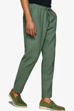 Green textured drawstring trousers