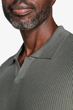 Green textured knit polo shirt