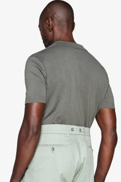 Green textured knit polo shirt