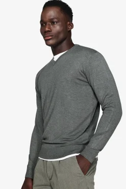 Green V-neck sweater