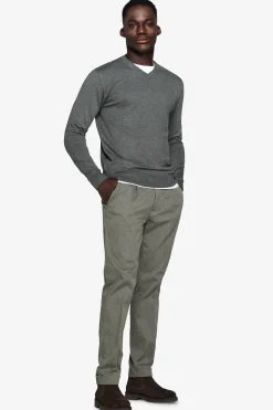 Green V-neck sweater