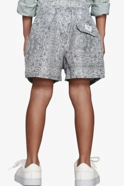 KIDS Sage floral print swim trunks