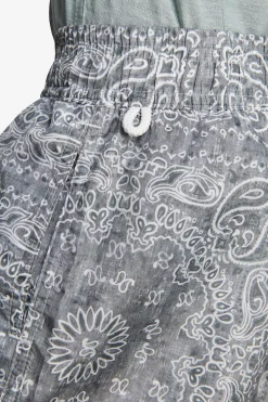 KIDS Sage floral print swim trunks