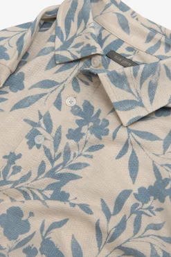 Light blue flower pattern piquet polo shirt