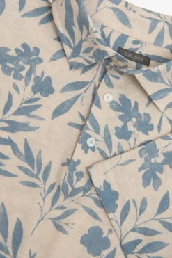 Light blue flower pattern piquet polo shirt