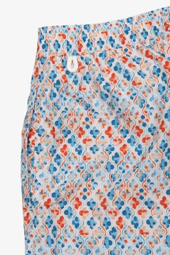 Orange lily print swim trunks