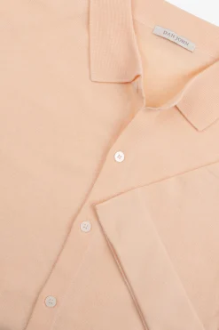 Peach short sleeved knit shirt