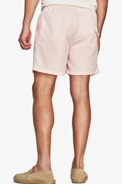 Pink striped seersucker swim trunks